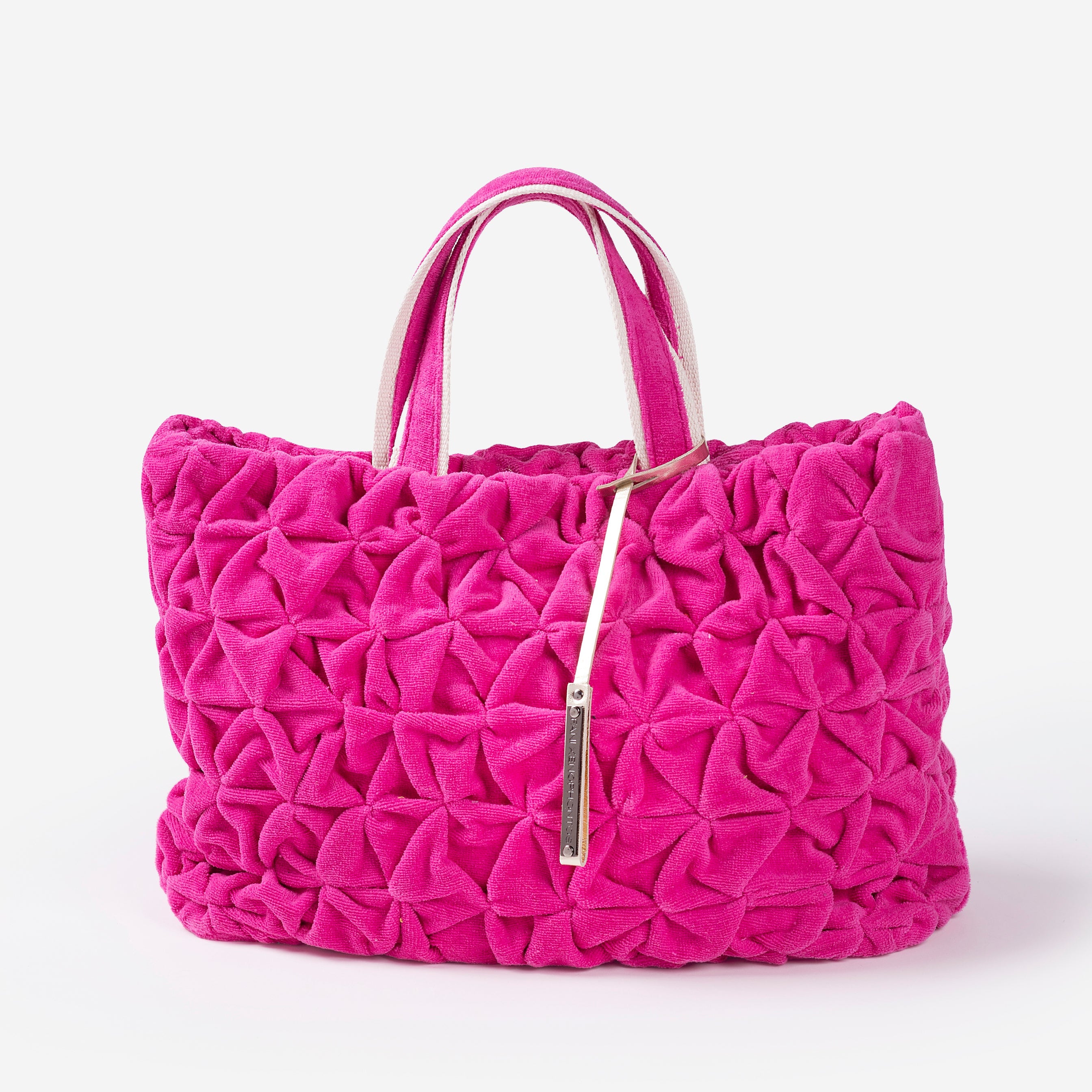 Pink beach bag on a white background